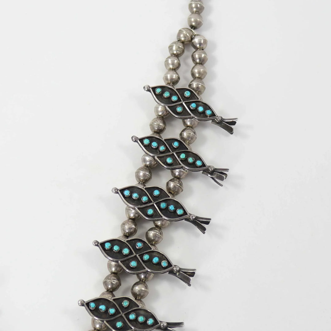 1960s Turquoise Snake Eye Squash Blossom by Vintage Collection - Garland's