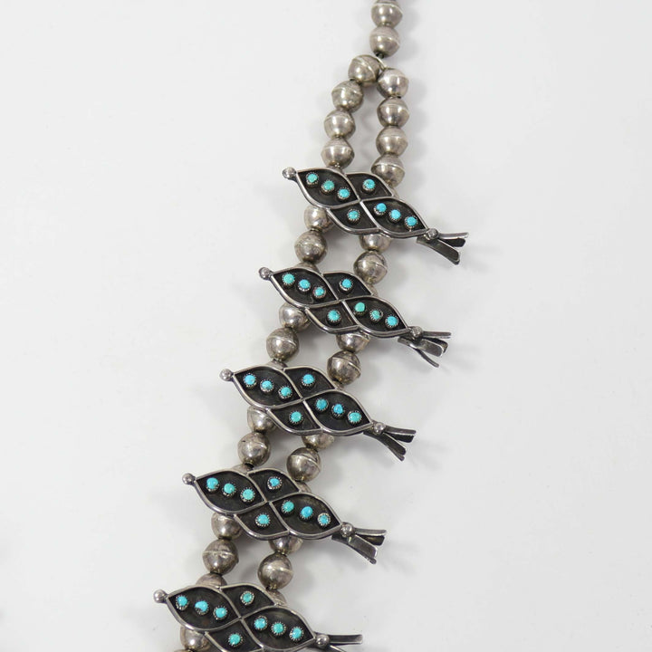 1960s Turquoise Snake Eye Squash Blossom by Vintage Collection - Garland's