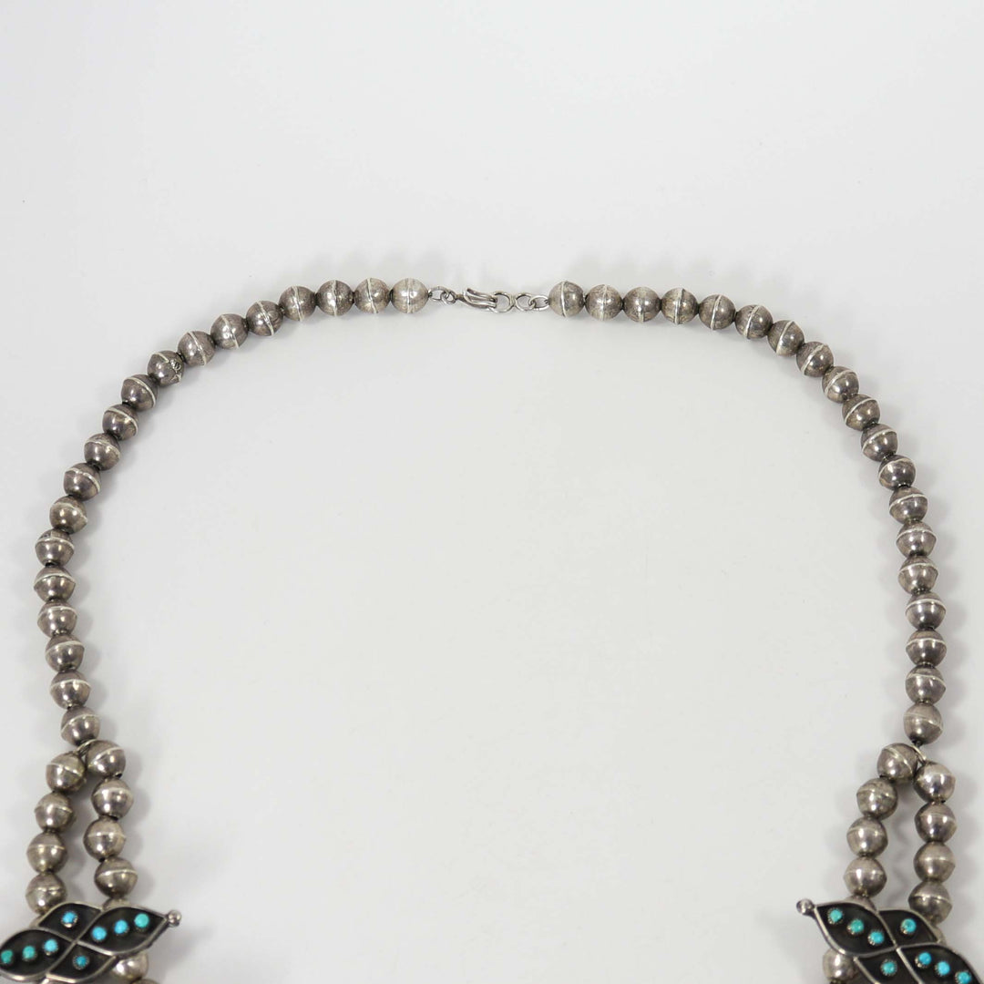 1960s Turquoise Snake Eye Squash Blossom by Vintage Collection - Garland's
