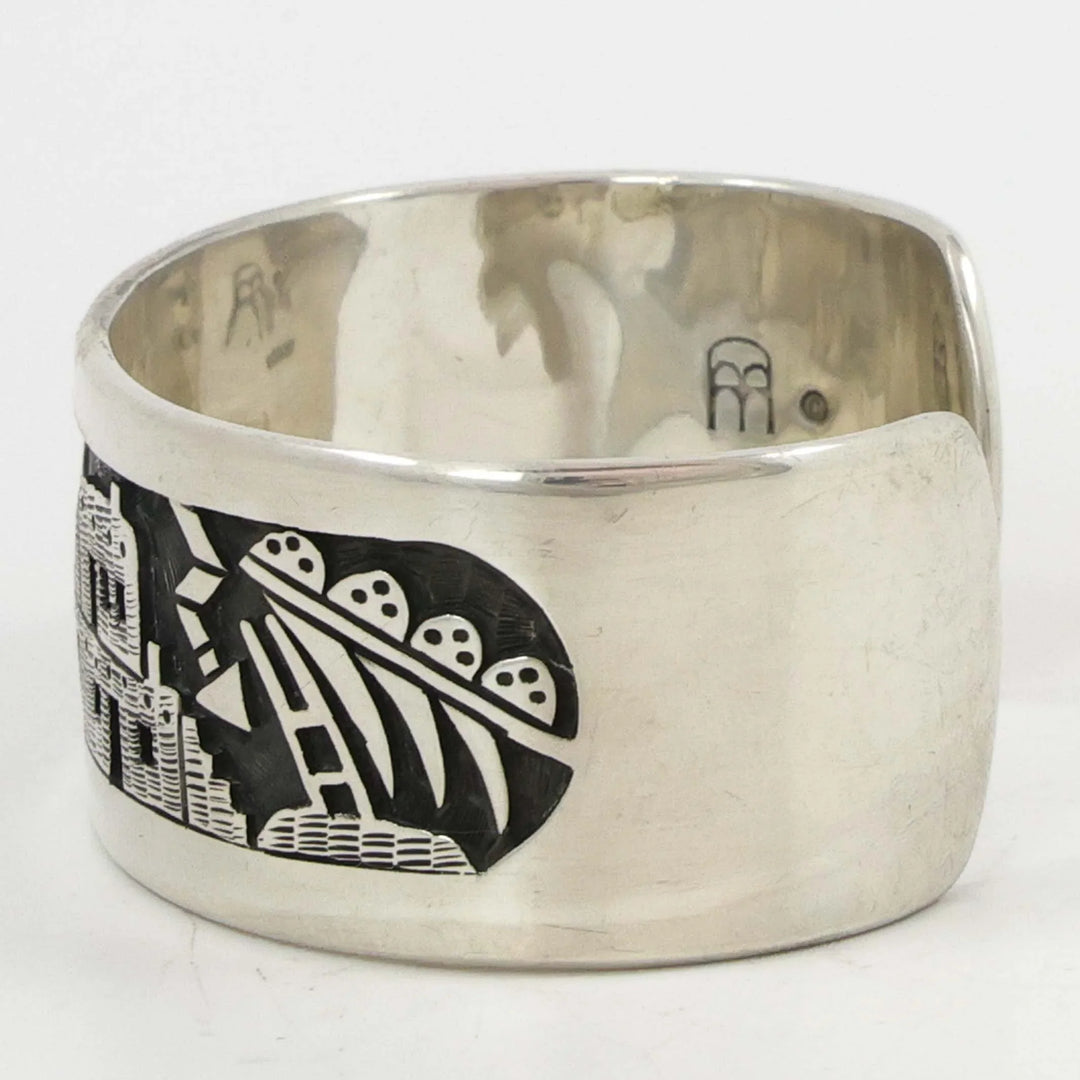 Flute Player and Village Cuff
