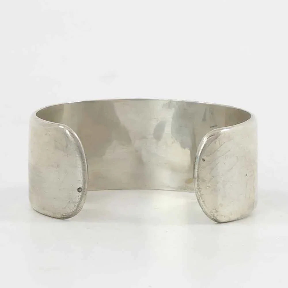 Flute Player and Village Cuff