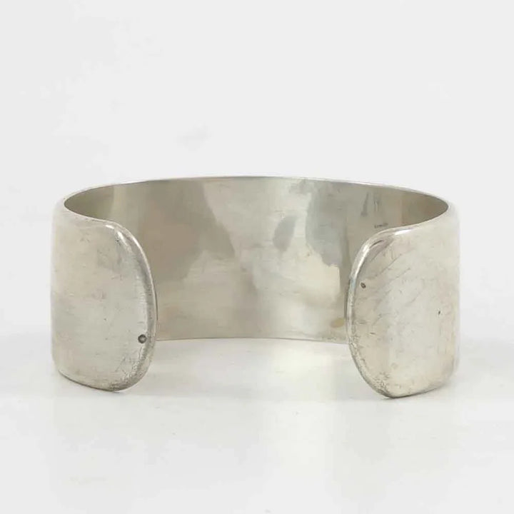 Flute Player and Village Cuff
