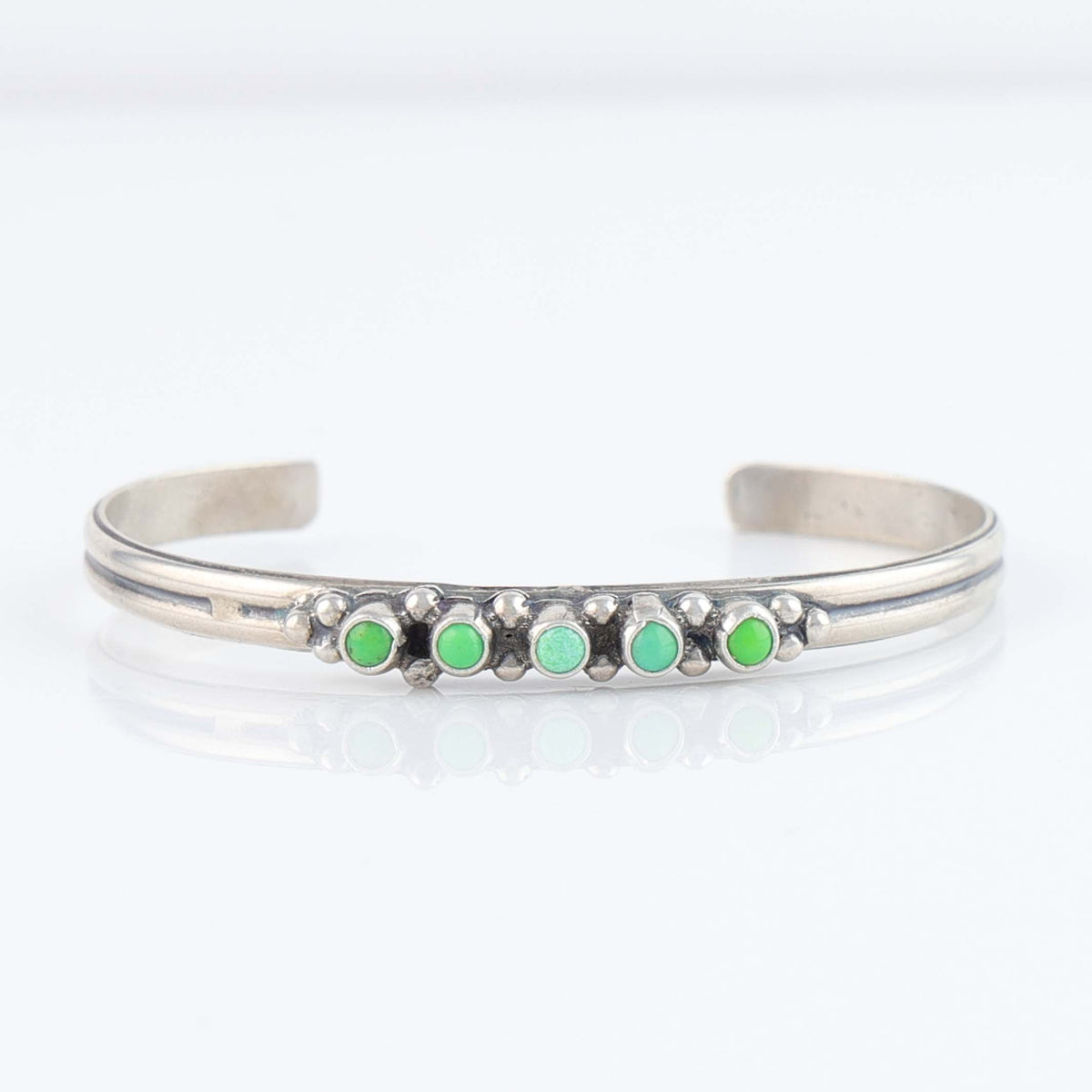 Gaspeite Row Cuff by Don Lucas