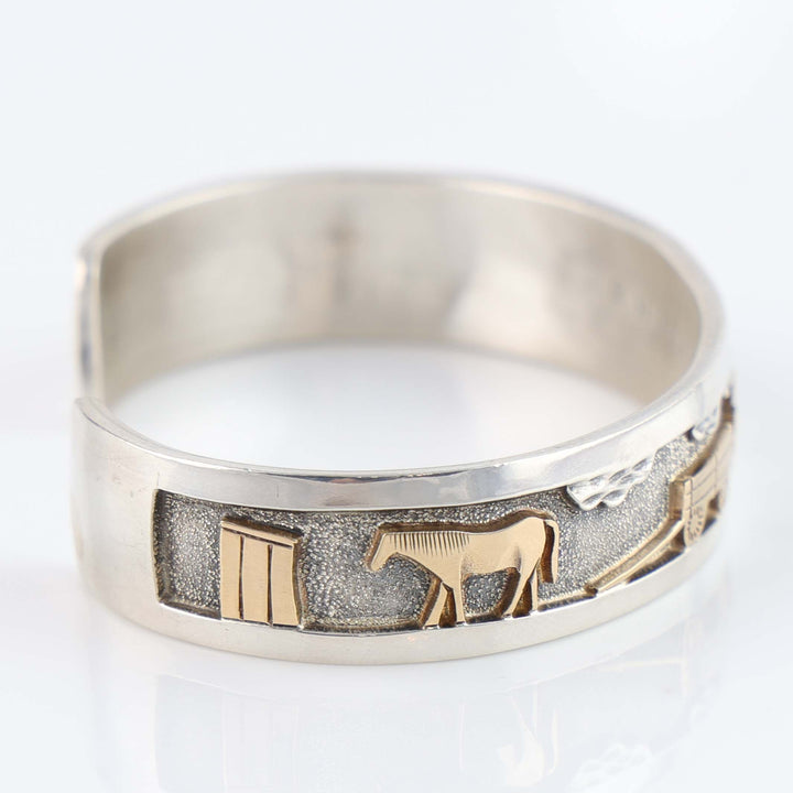 Gold on Silver Navajo Storyteller Cuff