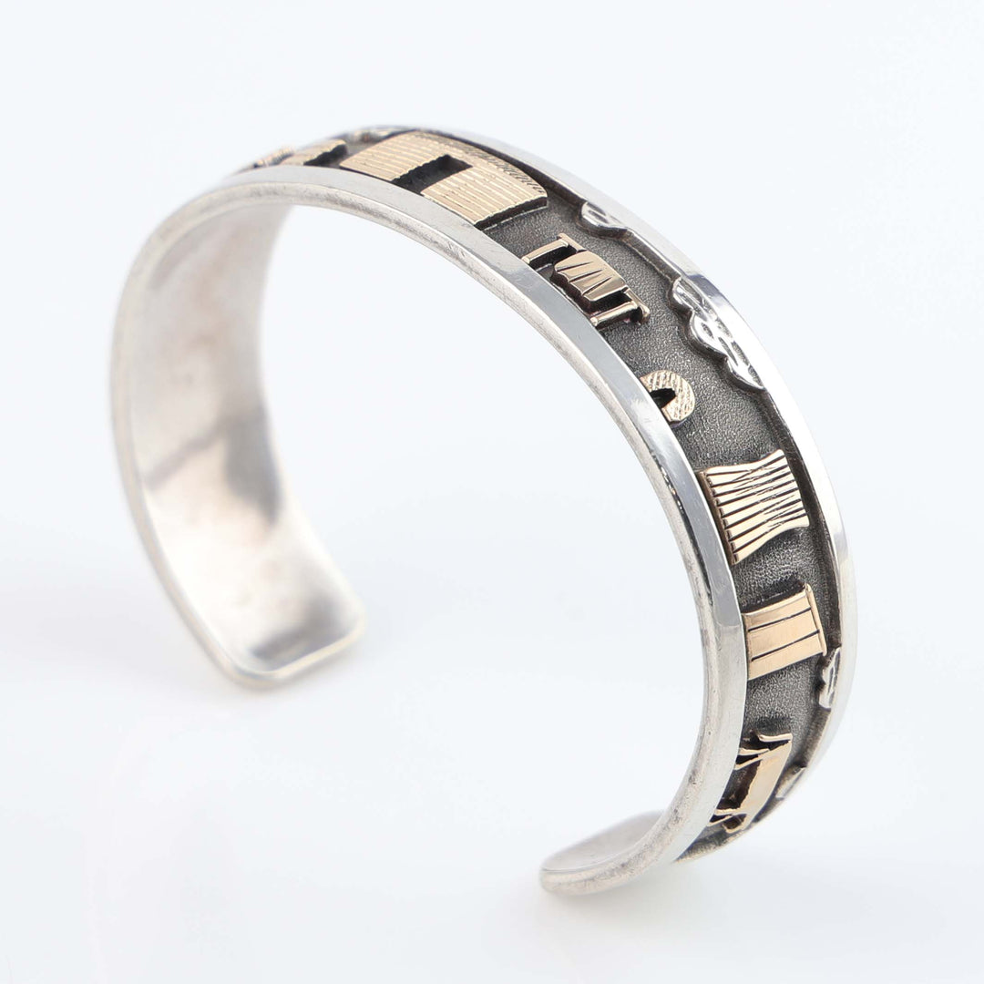 Gold on Silver Navajo Storyteller Cuff