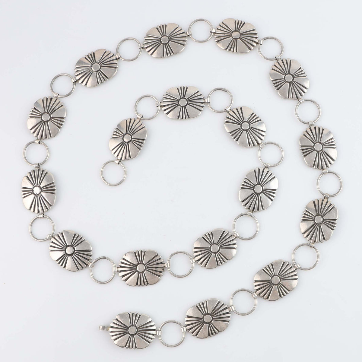 1960s Navajo Sunburst Link Concho Belt