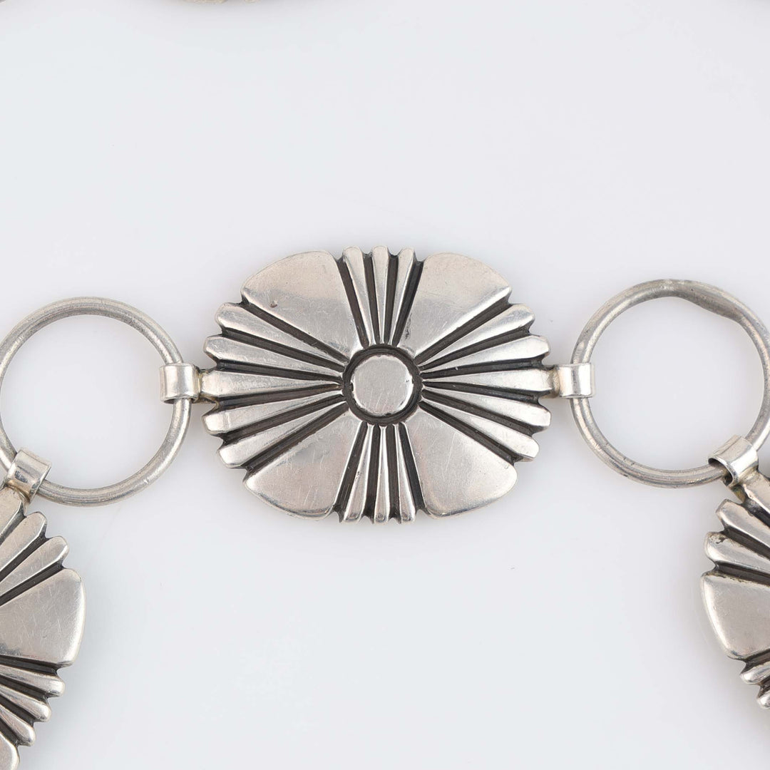 1960s Navajo Sunburst Link Concho Belt
