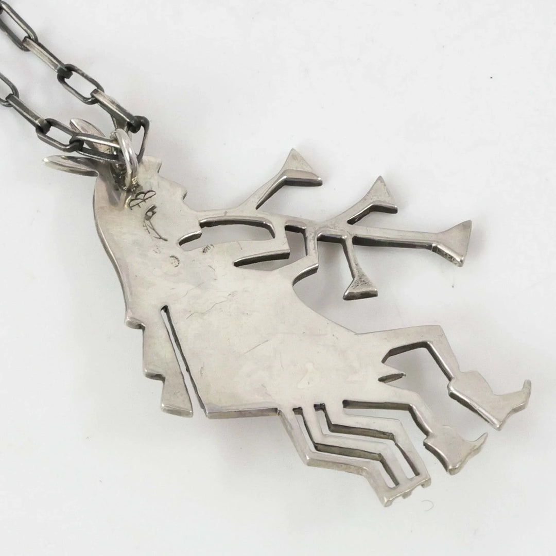 1970s Coral Flute Player Pendant