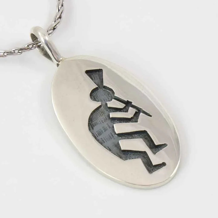 Flute Player Pendant