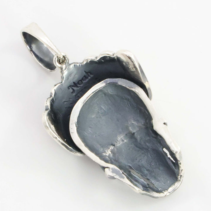 Turquoise and Coral Skull Pendant