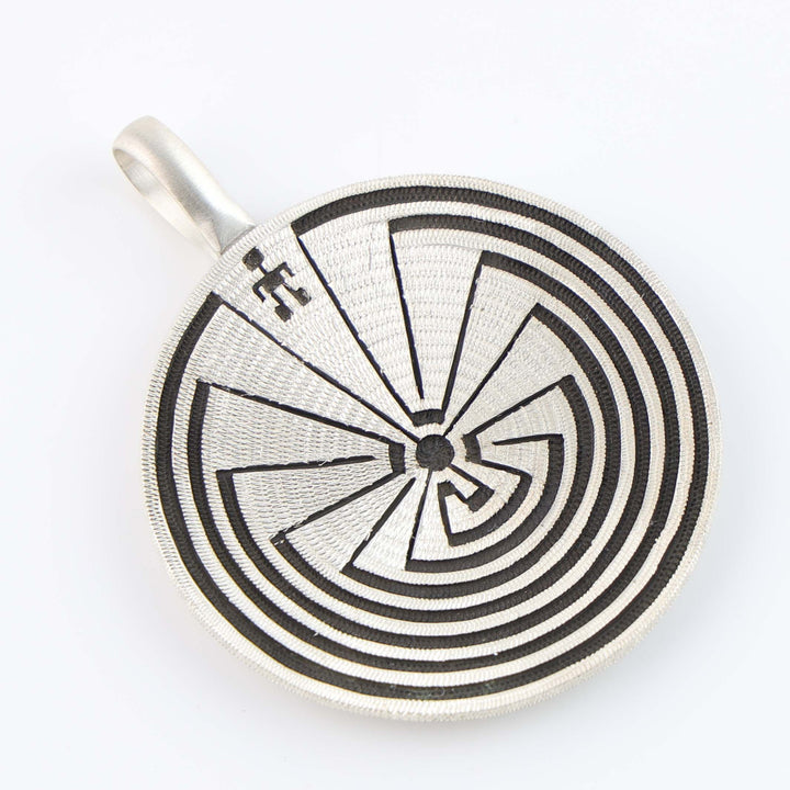 Man in the Maze Basket Pendant