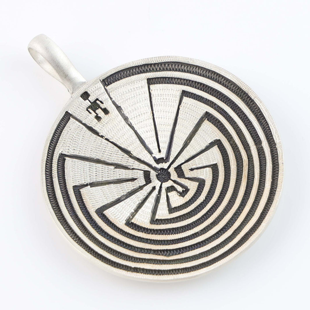 Man in the Maze Basket Pendant