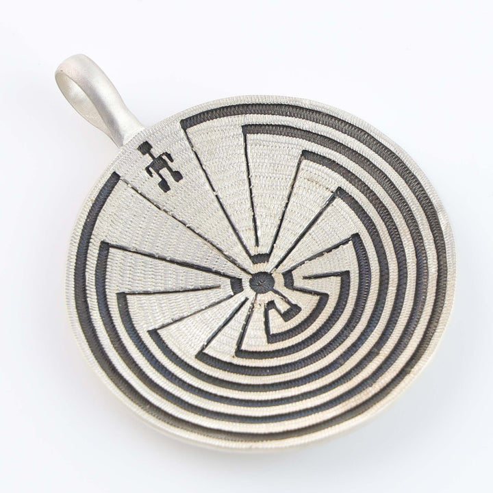 Man in the Maze Basket Pendant