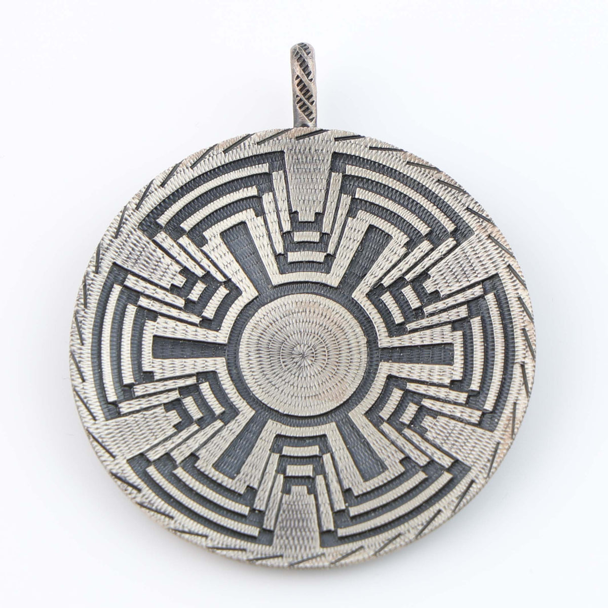 Tohono O’Odham Basket Pendant by Roland Begay