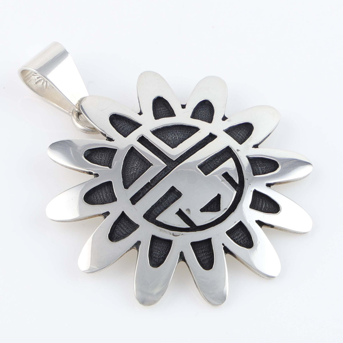 Hopi Sunface Pendant by Anderson Koinva