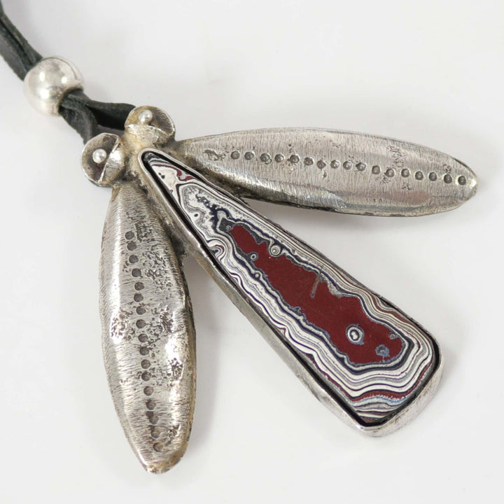 Fordite Bug Pendant by Jock Favour - Garland's