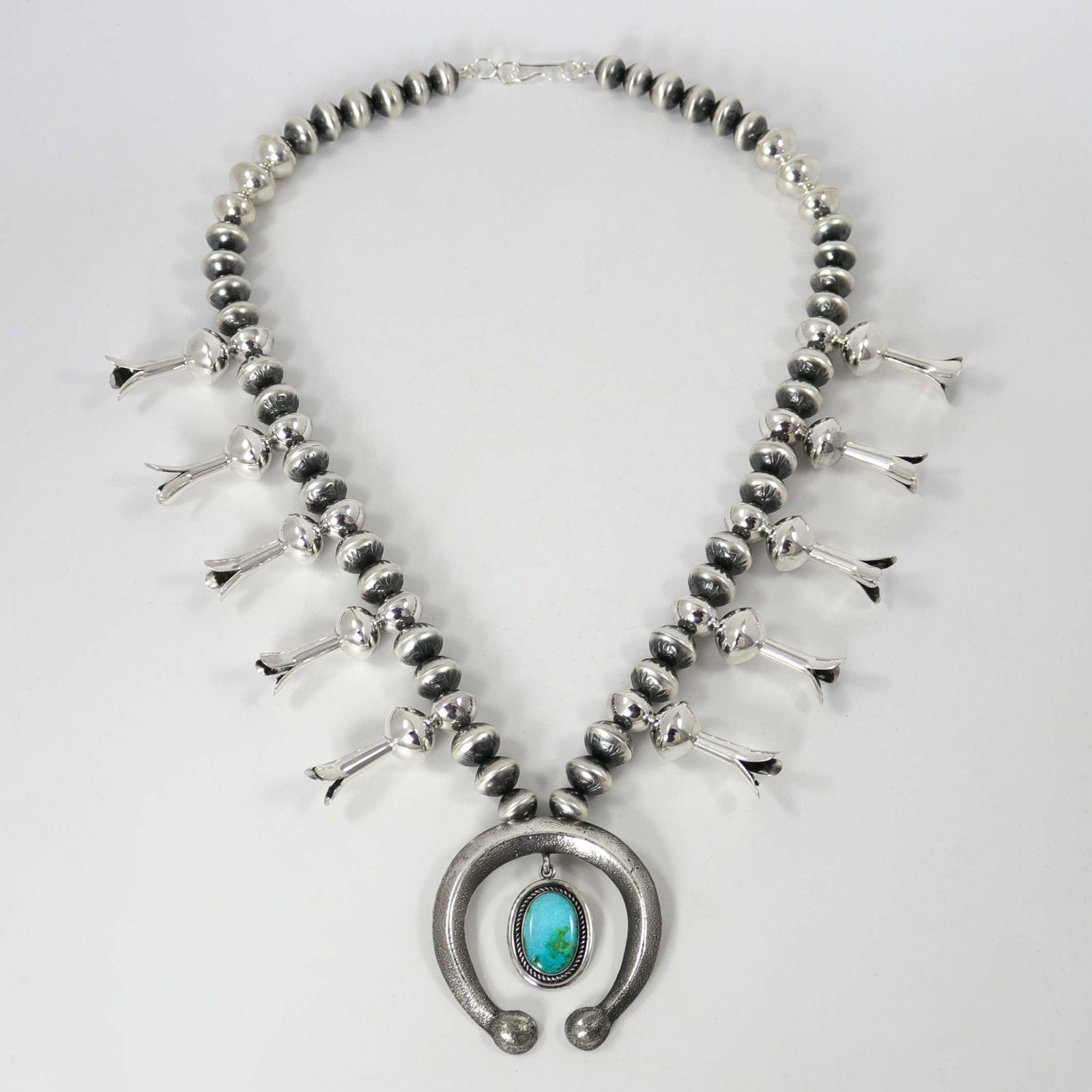 Kingman Turquoise Squash Blossom Necklace by Benjamin and Ruby Haley - Garland's