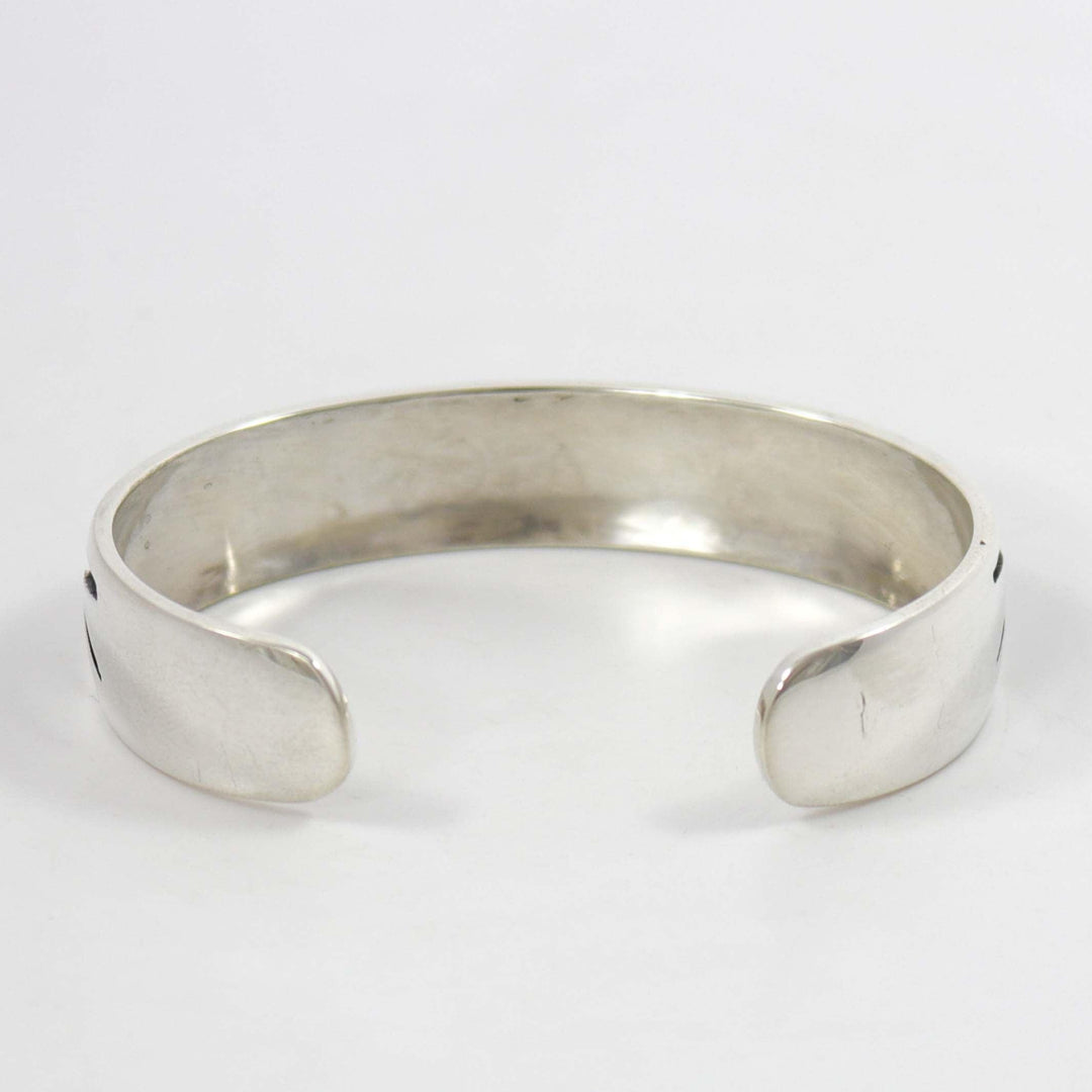 Prayer Feather Cuff by Anderson Koinva - Garland&