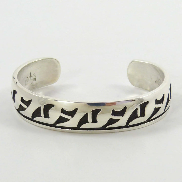 Prayer Feather Cuff by Anderson Koinva - Garland's