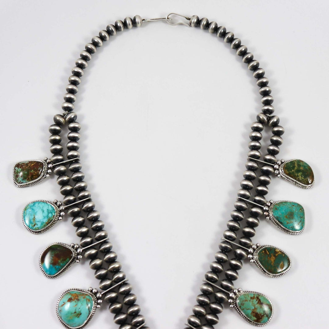 Royston Turquoise Squash Blossom by Clarissa and Vernon Hale - Garland's