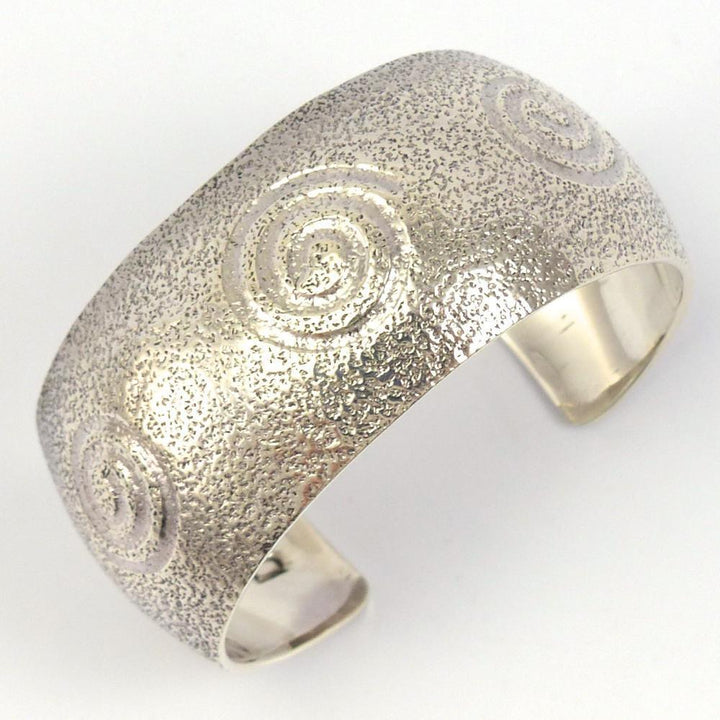 Migration Swirl Cuff by Derrick Joe - Garland's